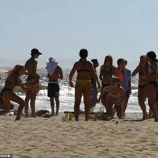 全美确诊破百万, 上周加州却有近5万人不戴口罩前往海边避暑...